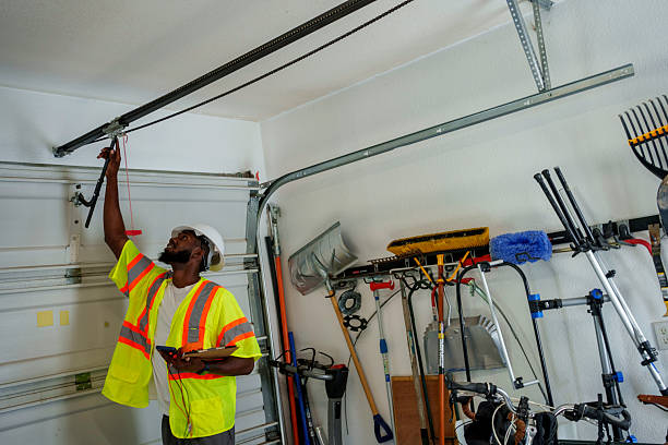 Professional Garage Door Panel Replacement technician working in Leland, MS